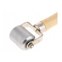 PROVULKA : RPTA0013L50 - Outil à rouleter pour emplâtre et pièce pour réparation de pneu - roulette en 50mm. Vue zoom
